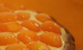 Tarte au melon en billes, pâte sablée à l’huile d’olive et crème pâtissière aux zestes de citron